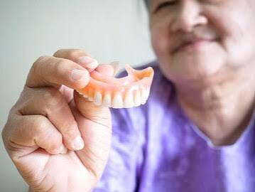 Custom-fitted dentures for a confident smile